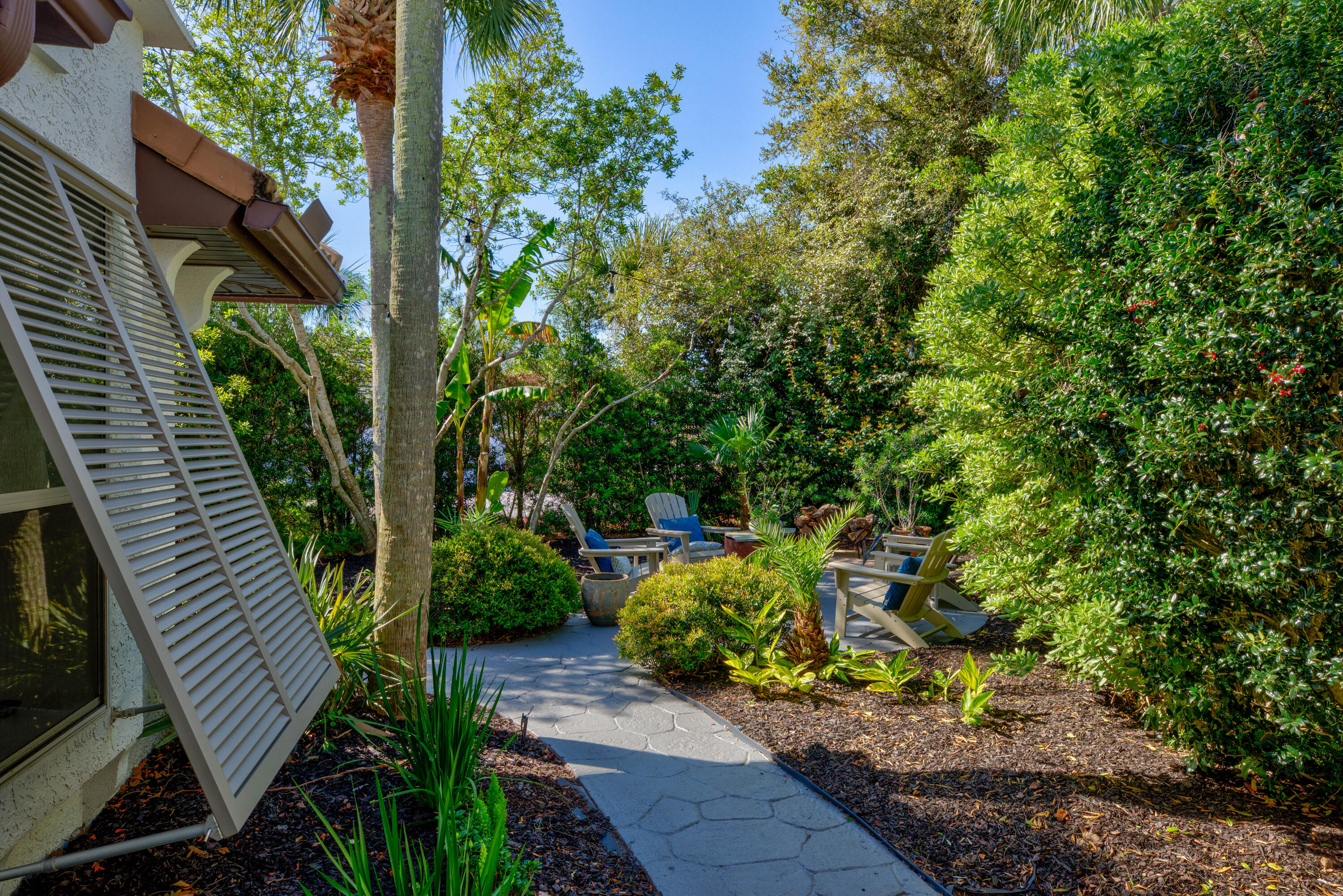 4639 Paradise Isle Destin, FL 32541 - Photo 4 of 67 a view of a garden with plants