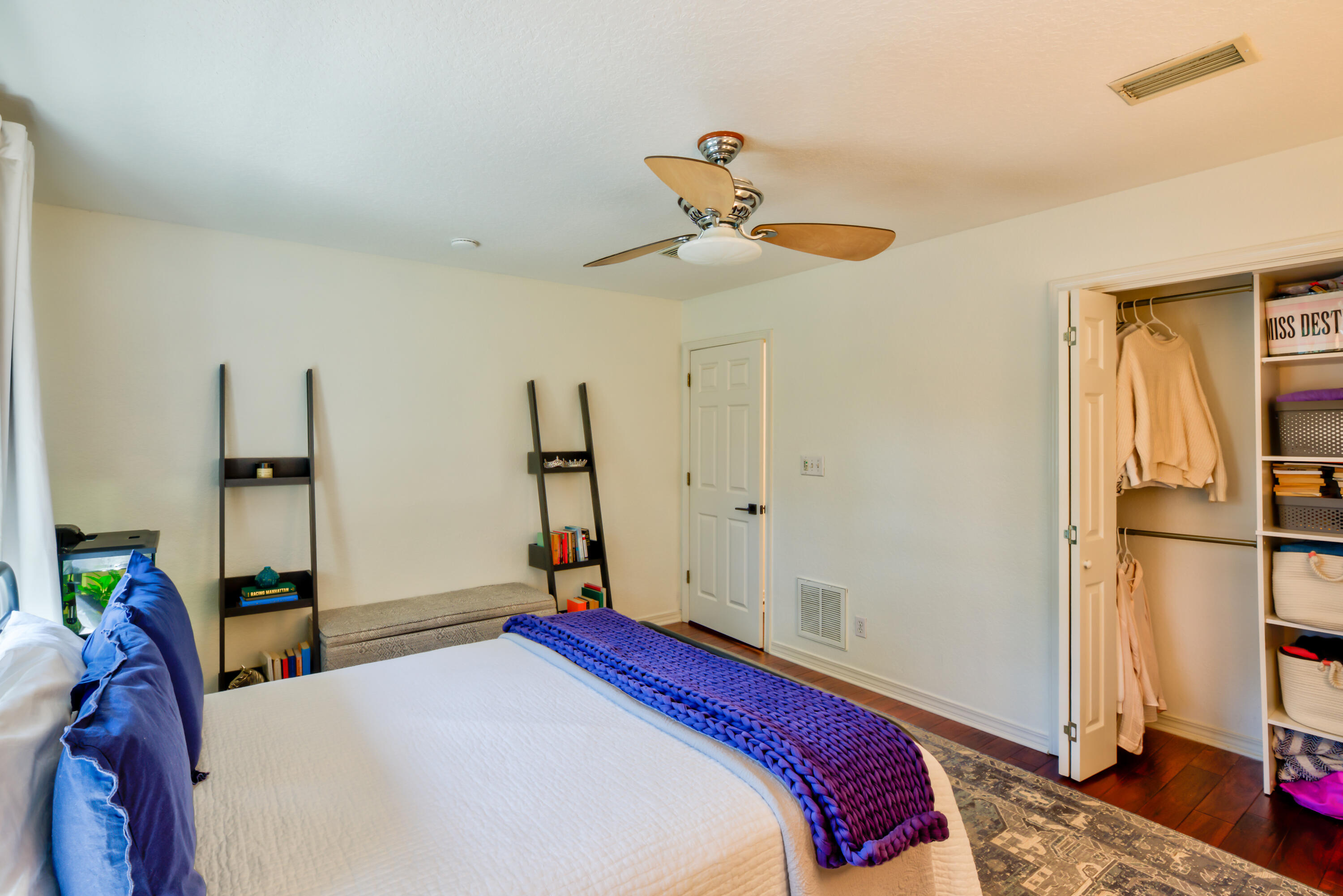 4639 Paradise Isle Destin, FL 32541 - Photo 55 of 67 a bedroom with a bed a chandelier and a window