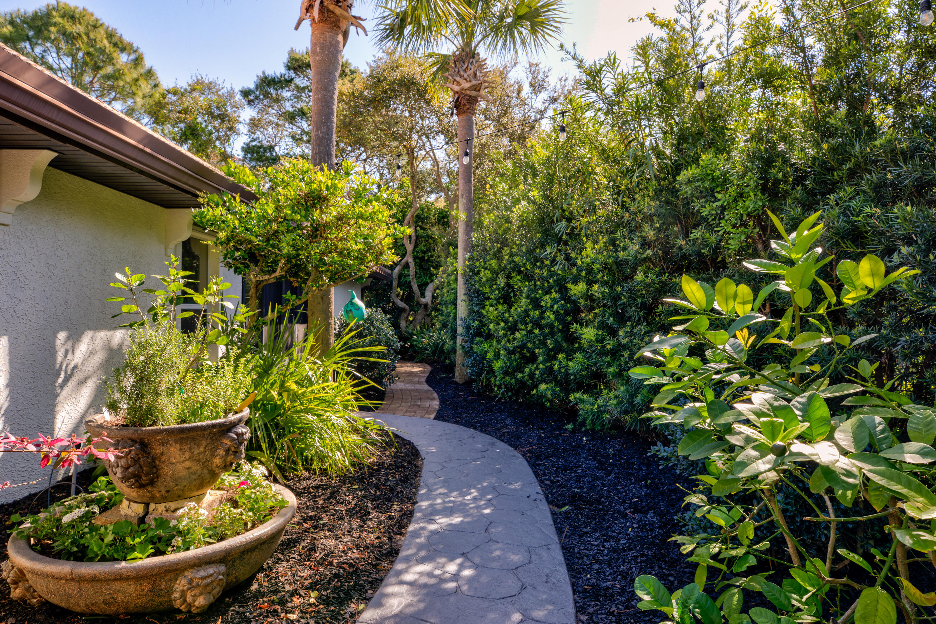 4639 Paradise Isle Destin, FL 32541 - Photo 7 of 67 a view of a garden with plants