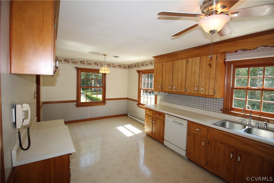 14111 Puritan Road Chesterfield, VA 23838 - Photo 12 of 49 a open kitchen with stainless steel appliances granite countertop a sink dishwasher and a stove with wooden floor