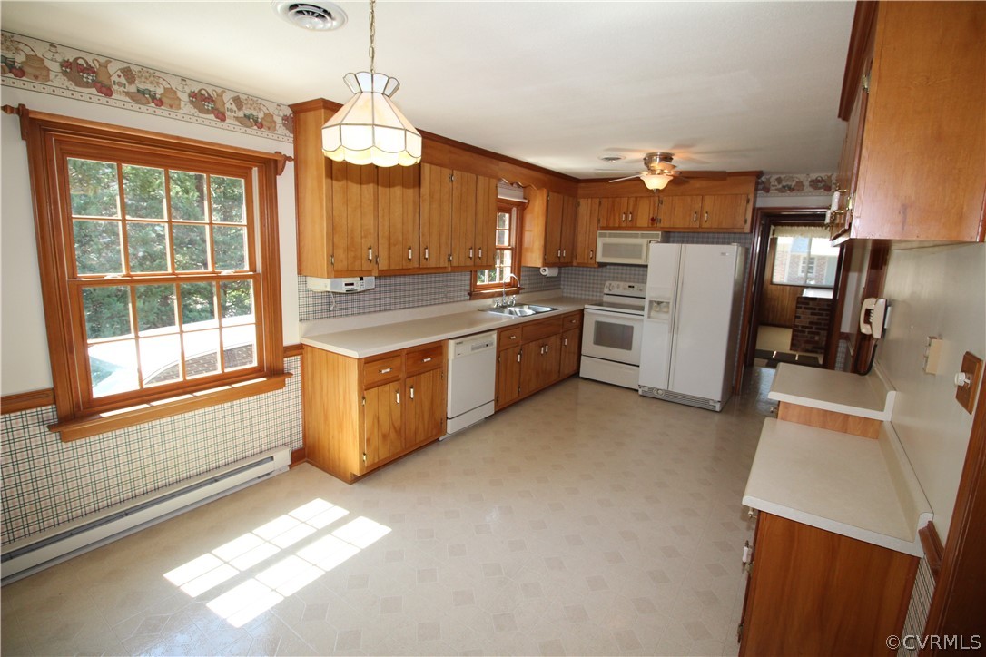 14111 Puritan Road Chesterfield, VA 23838 - Photo 13 of 49 a kitchen with refrigerator and window
