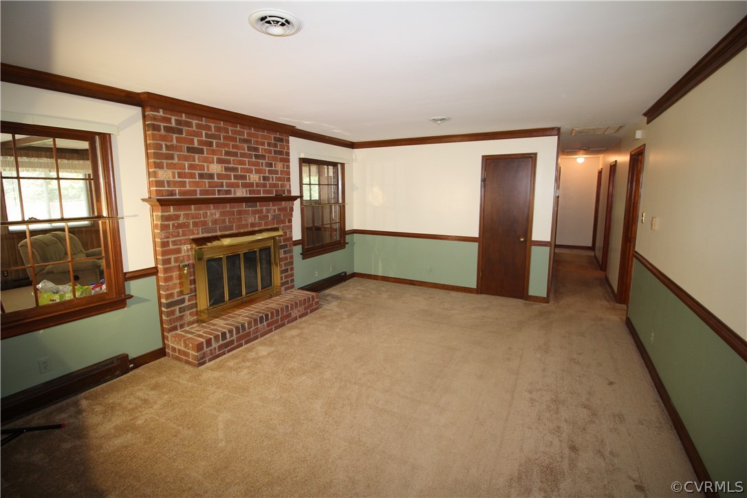 14111 Puritan Road Chesterfield, VA 23838 - Photo 15 of 49 a view of an empty room with a fireplace and a window