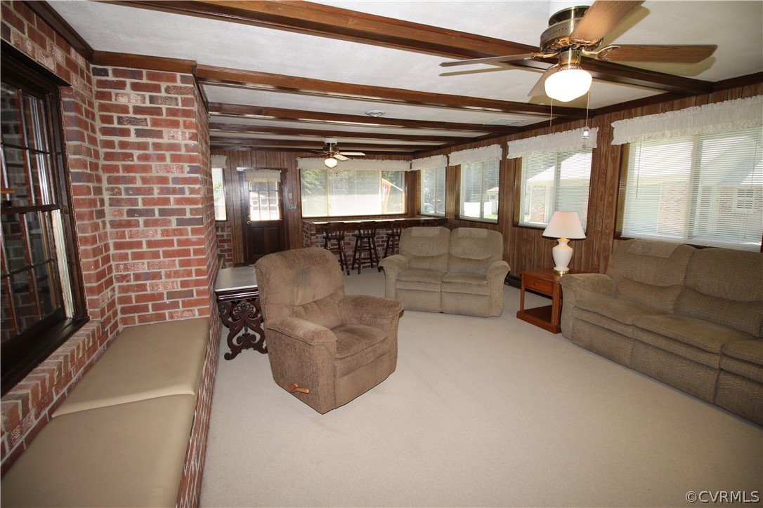 14111 Puritan Road Chesterfield, VA 23838 - Photo 27 of 49 a living room with furniture and a flat screen tv