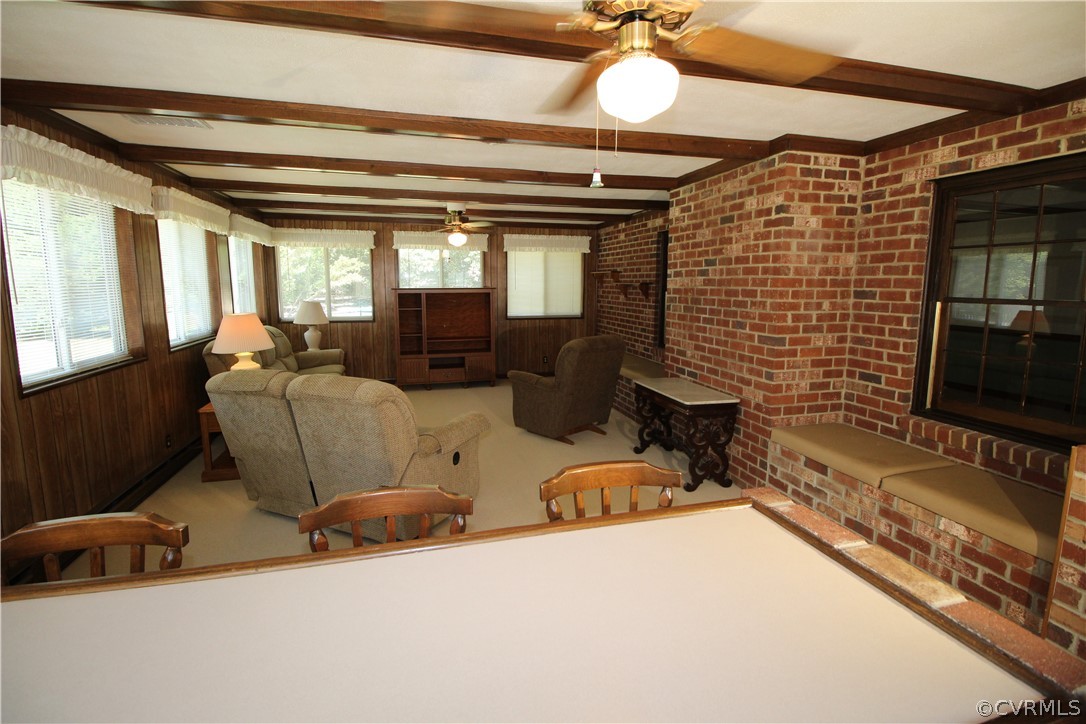 14111 Puritan Road Chesterfield, VA 23838 - Photo 29 of 49 a living room with furniture and a flat screen tv