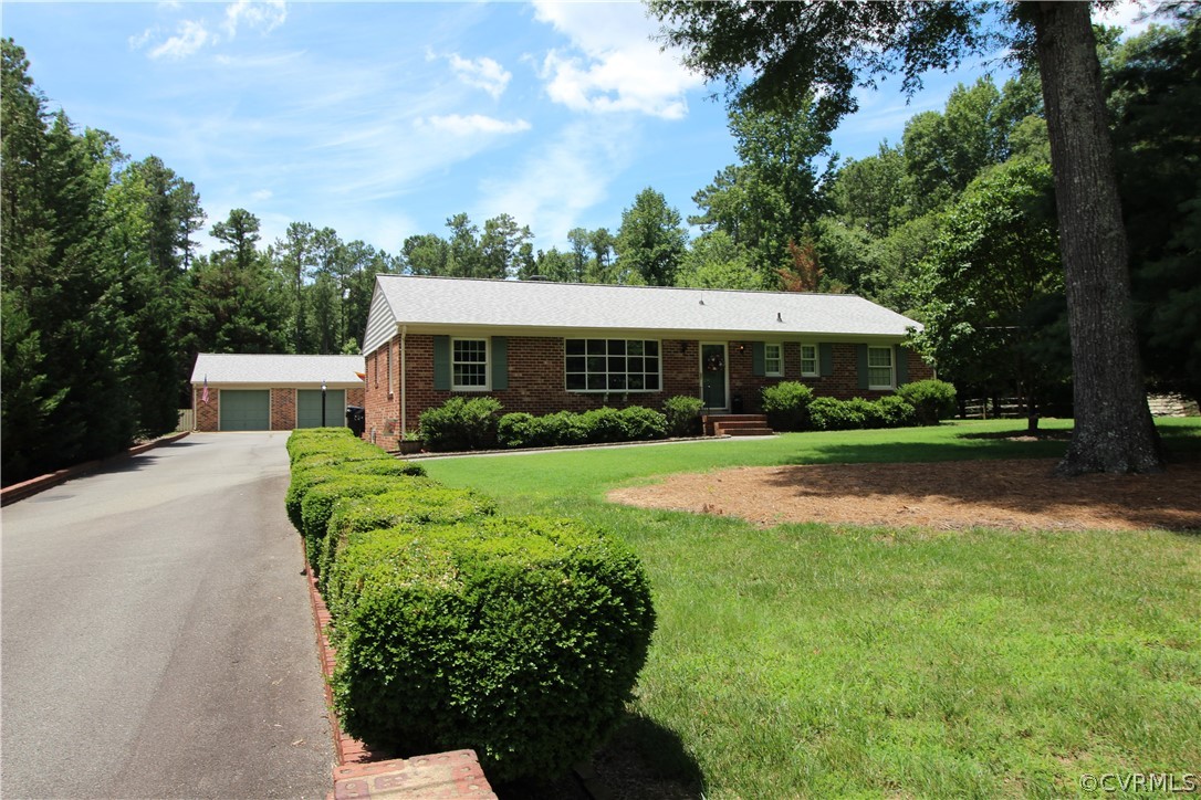 14111 Puritan Road Chesterfield, VA 23838 - Photo 3 of 49 a view of a house with a yard