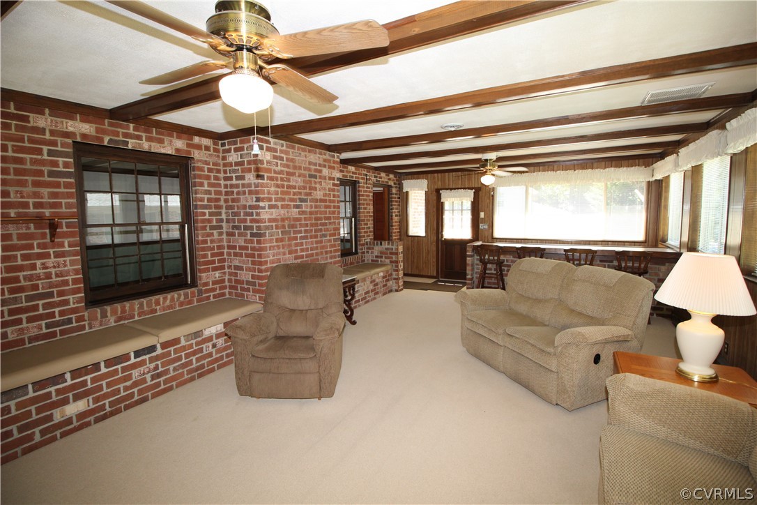 14111 Puritan Road Chesterfield, VA 23838 - Photo 32 of 49 a living room with furniture and a fireplace
