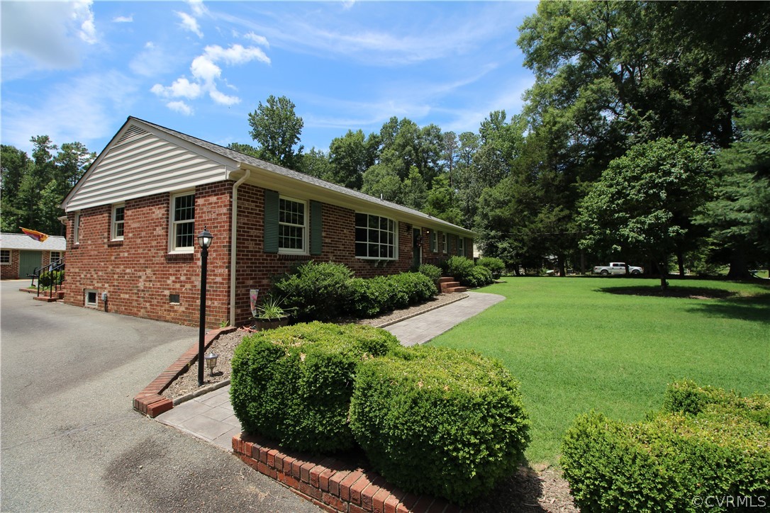 14111 Puritan Road Chesterfield, VA 23838 - Photo 36 of 49 a view of a house with backyard and garden