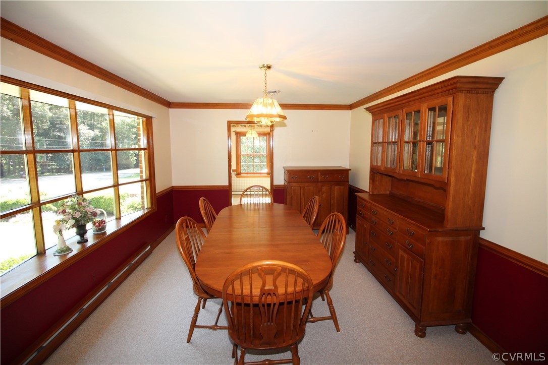 14111 Puritan Road Chesterfield, VA 23838 - Photo 10 of 49 a dining room with furniture window and wooden floor