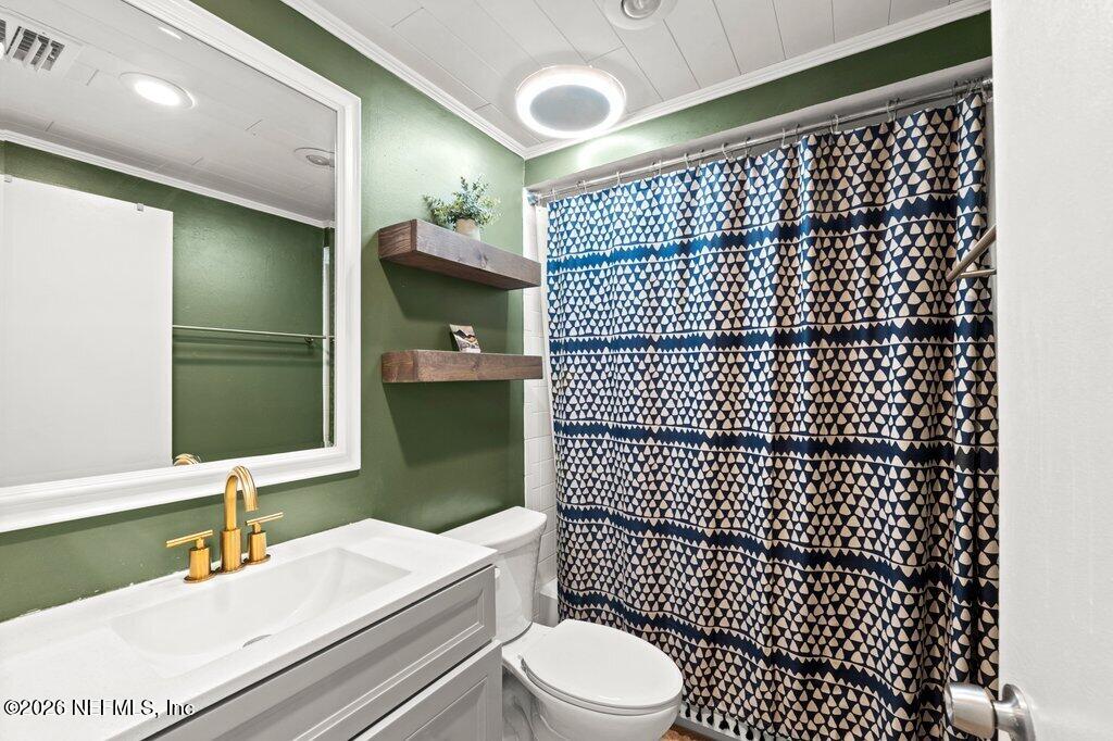 1810 Kings Way Neptune Beach, FL 32266 - Photo 17 of 40 a bathroom with a sink toilet and shower