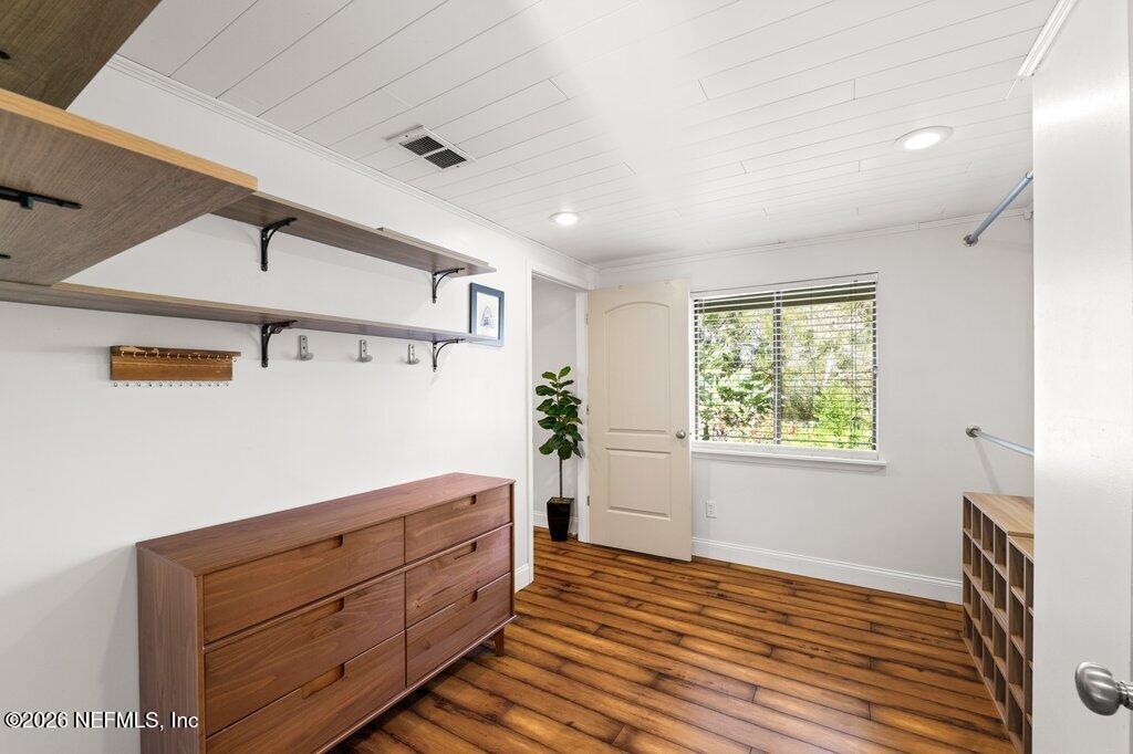 1810 Kings Way Neptune Beach, FL 32266 - Photo 18 of 40 a room with a dresser and a window