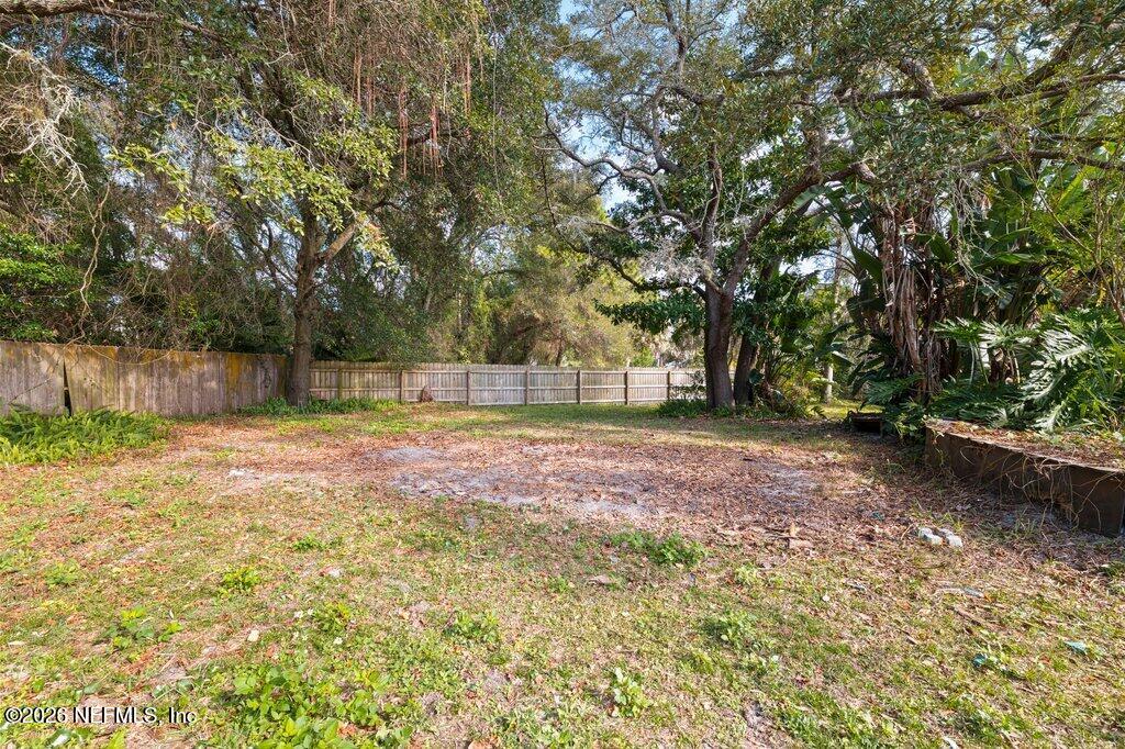 1810 Kings Way Neptune Beach, FL 32266 - Photo 33 of 40 a view of backyard with large trees