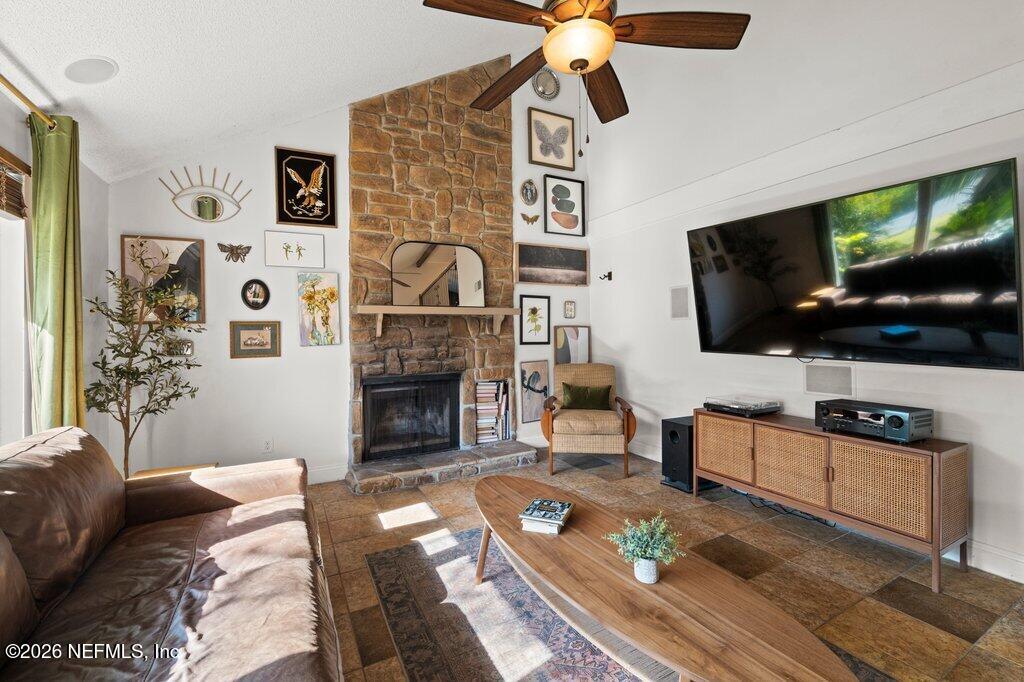 1810 Kings Way Neptune Beach, FL 32266 - Photo 6 of 40 a living room with furniture and a flat screen tv
