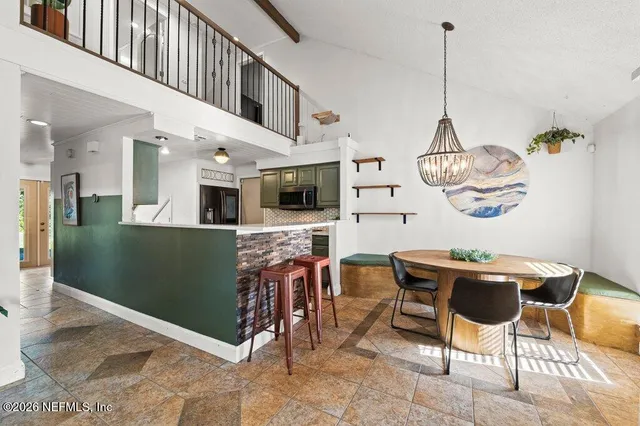 a view of a dining room and livingroom view