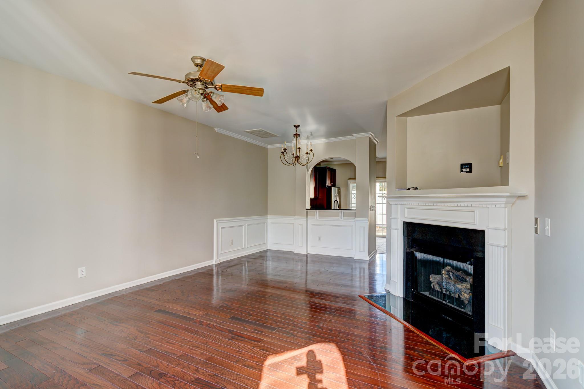417 River Park Road Belmont, NC 28012 - Photo 3 of 16 a living room with furniture and a fireplace