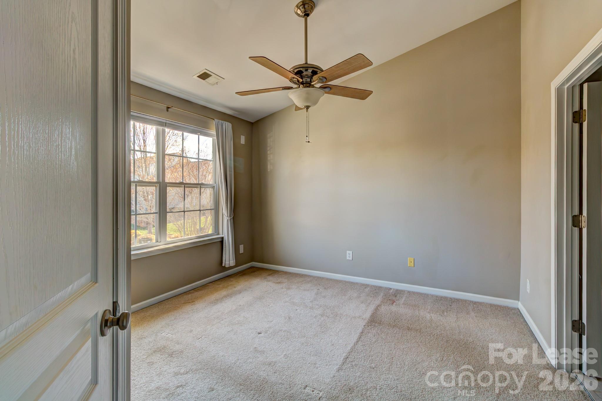 417 River Park Road Belmont, NC 28012 - Photo 8 of 16 a view of an empty room with a window