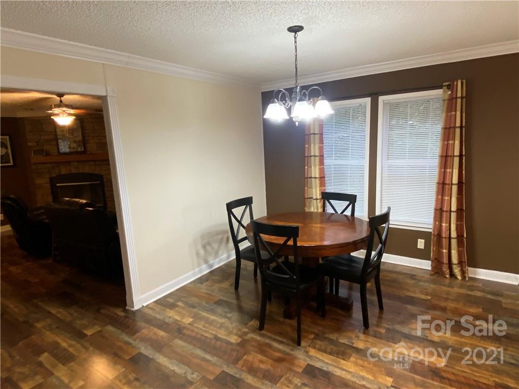 295 Bar Link Road Mount Pleasant, NC 28124 - Photo 14 of 29 a view of a dining room with furniture
