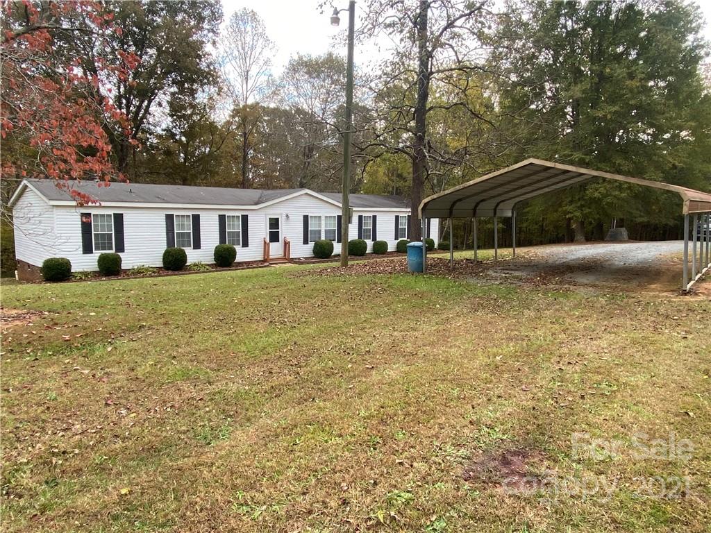 295 Bar Link Road Mount Pleasant, NC 28124 - Photo 3 of 29 a view of a house with a yard