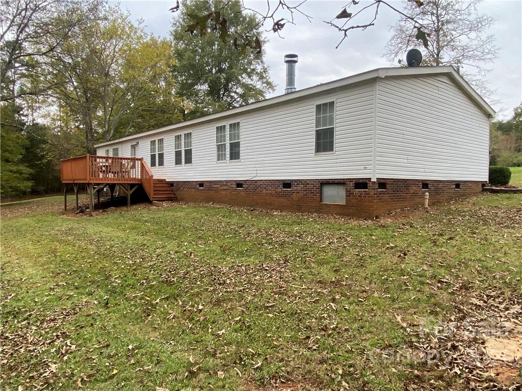 295 Bar Link Road Mount Pleasant, NC 28124 - Photo 4 of 29 a view of a house with a yard