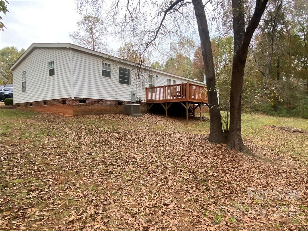 295 Bar Link Road Mount Pleasant, NC 28124 - Photo 6 of 29 a view of a house with a yard