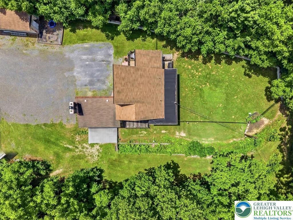 5340 2nd Street Whitehall, PA 18052 - Photo 27 of 30 An aerial perspective showcases a property nestled amidst verdant trees and ample yard space.