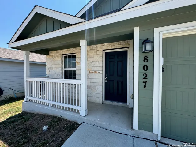 a view of a house with a porch