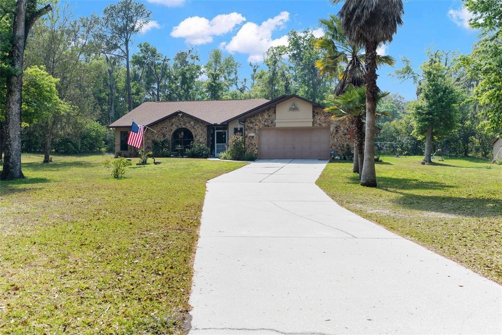 20376 Pinewood Dairy Road Brooksville, FL 34601 - Photo 1 of 1 Front Driveway