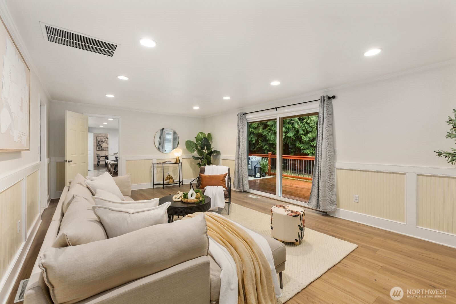 18505 Northeast 26th Street Redmond, WA 98052 - Photo 17 of 38 a living room with furniture and floor to ceiling windows