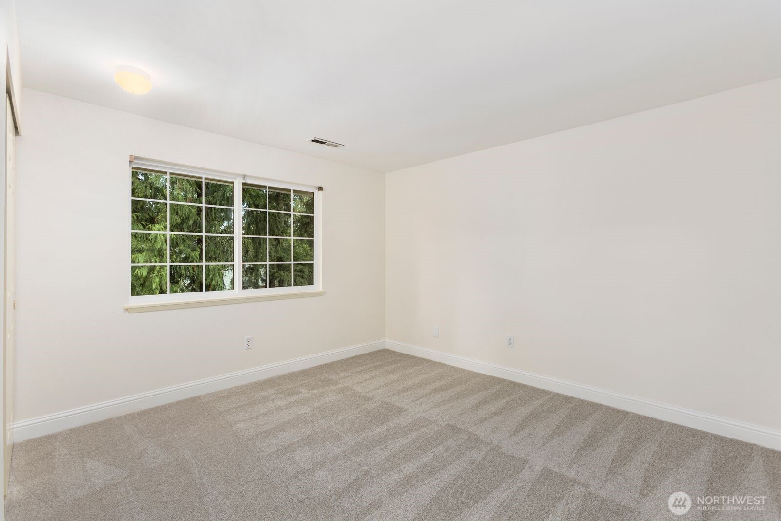 18505 Northeast 26th Street Redmond, WA 98052 - Photo 22 of 38 an empty room with a window