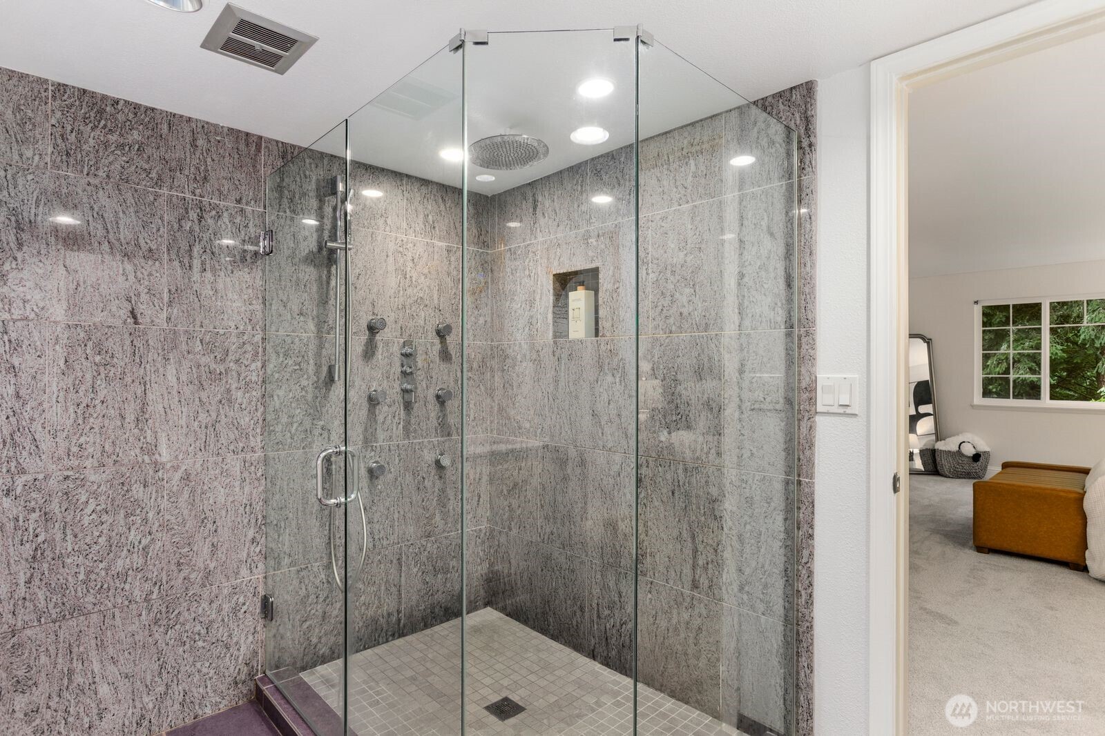 18505 Northeast 26th Street Redmond, WA 98052 - Photo 29 of 38 a bathroom with a shower and a sink