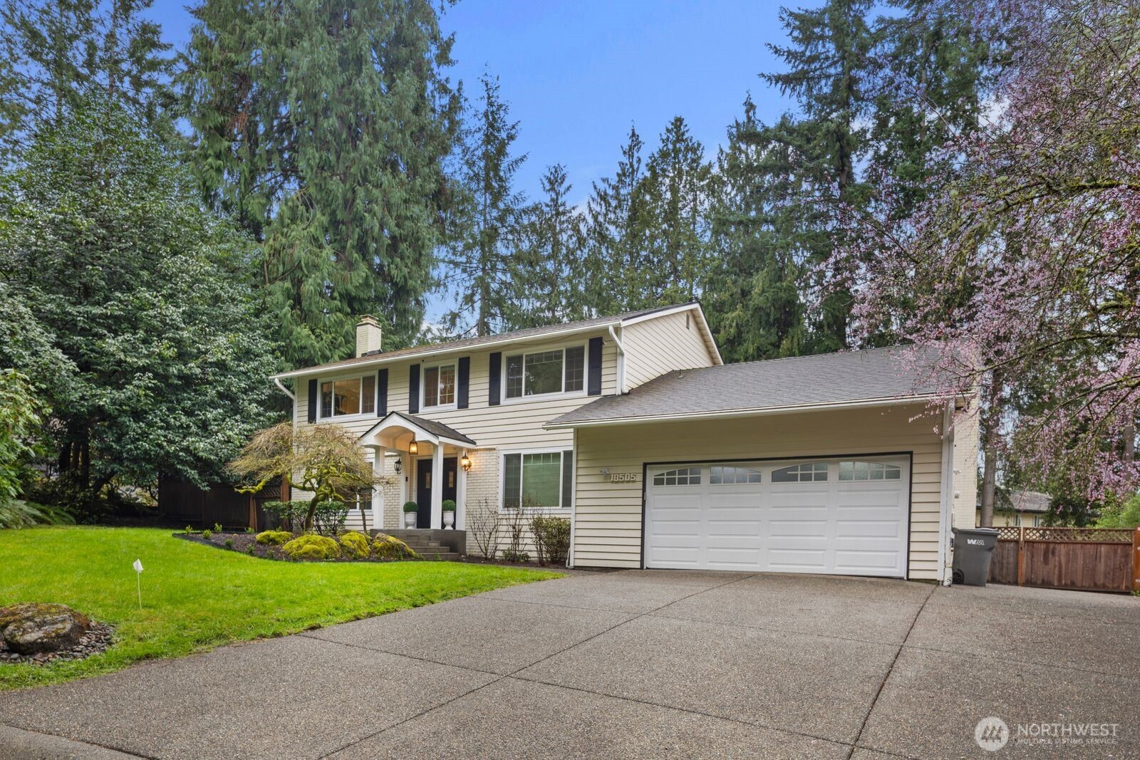 18505 Northeast 26th Street Redmond, WA 98052 - Photo 3 of 38 front view of a house with a yard