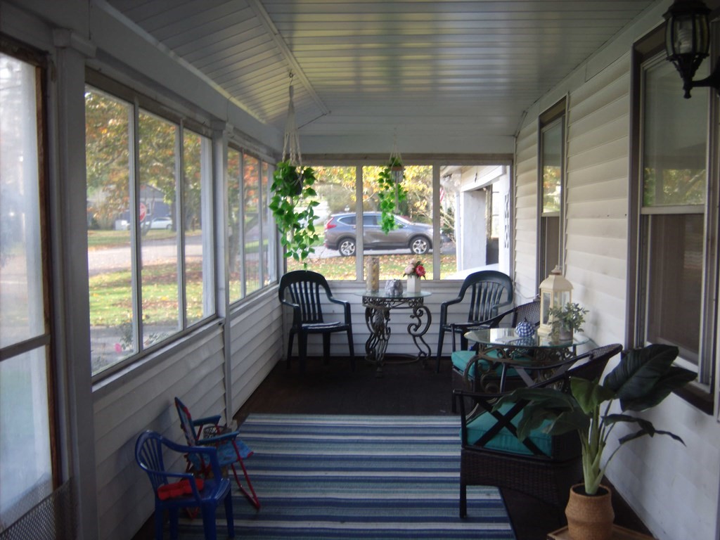 44 Beach Road Bristol, RI 02809 - Photo 5 of 11 a dining room with furniture window and outside view
