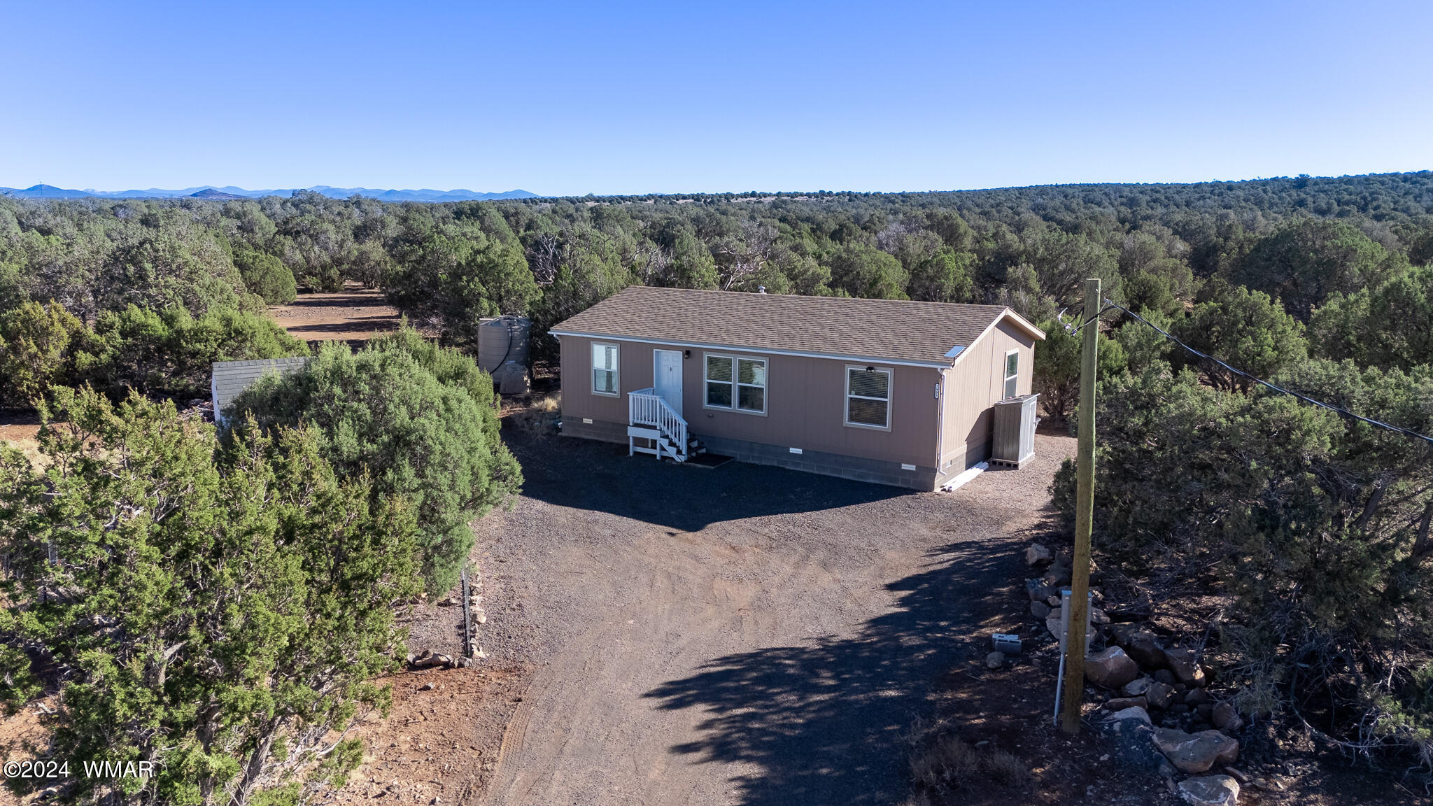 7991 Lakeland Road Show Low, AZ 85901 - Photo 2 of 24 DJI_20241210141447_0061_D