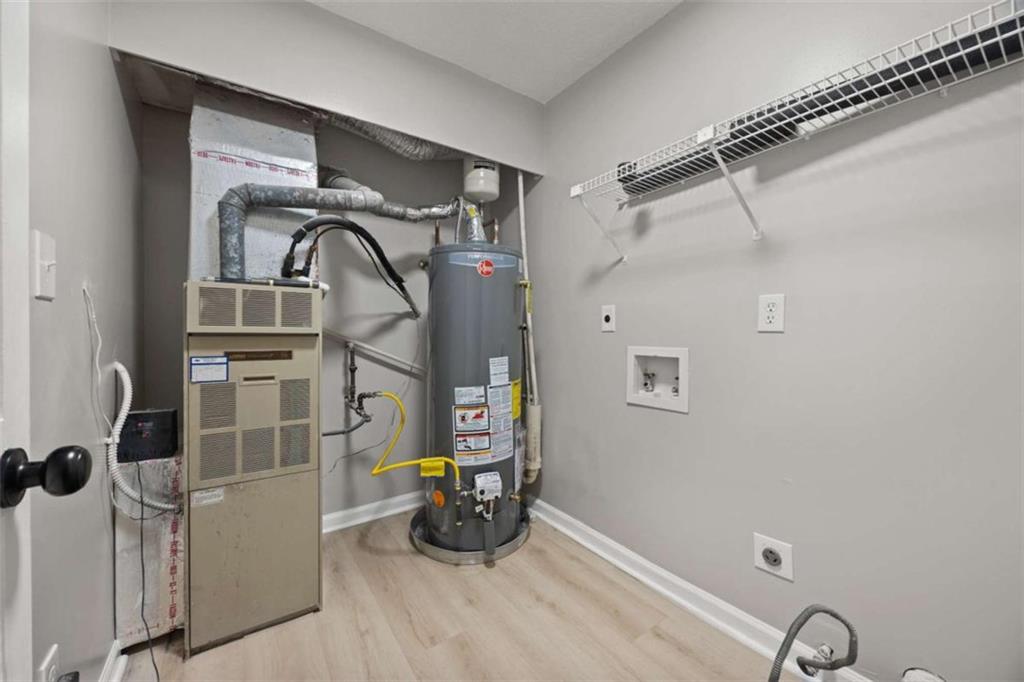 211 Cobblestone Trail Avondale Estates, GA 30002 - Photo 17 of 19 a view of storage and utility room