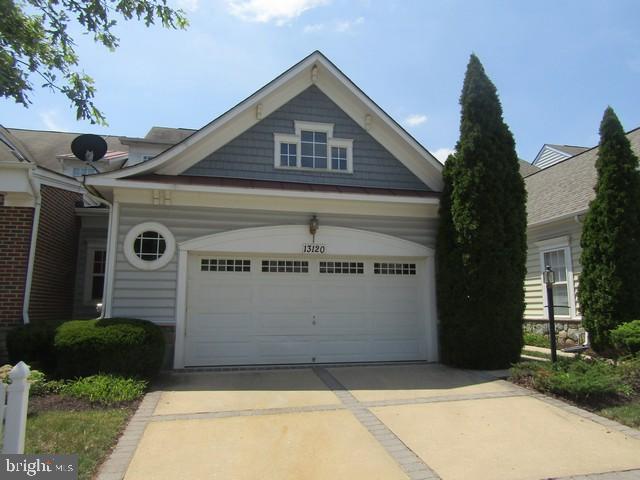 13120 Winding Trail Road Laurel, MD 20707 - Photo 1 of 15 a front view of a house with a yard