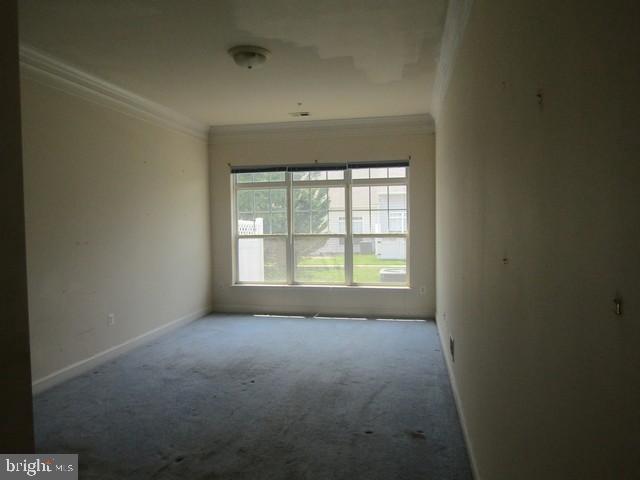 13120 Winding Trail Road Laurel, MD 20707 - Photo 5 of 15 a view of an empty room with a window