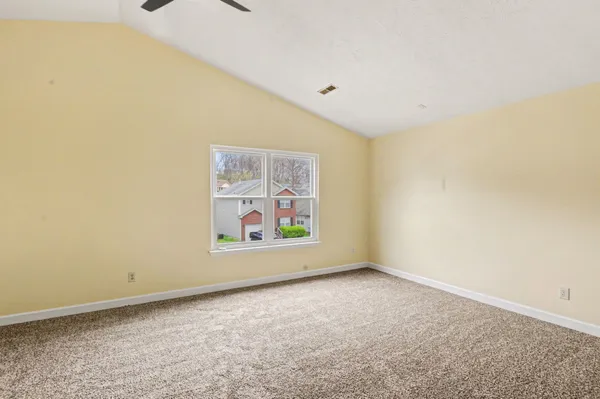 an empty room with window
