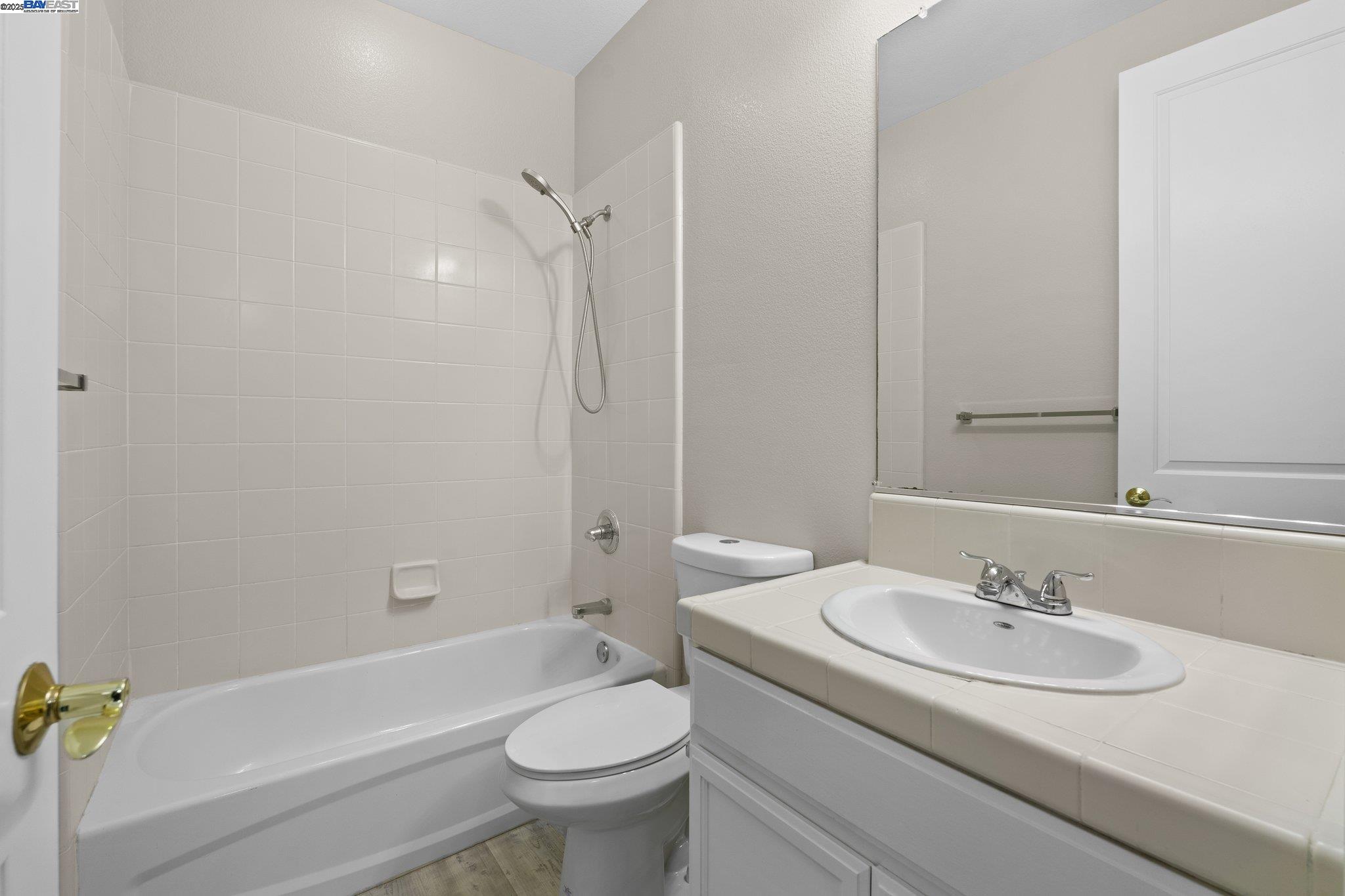 3658 Whitworth Drive Dublin, CA 94568 - Photo 24 of 36 a bathroom with a sink toilet and shower