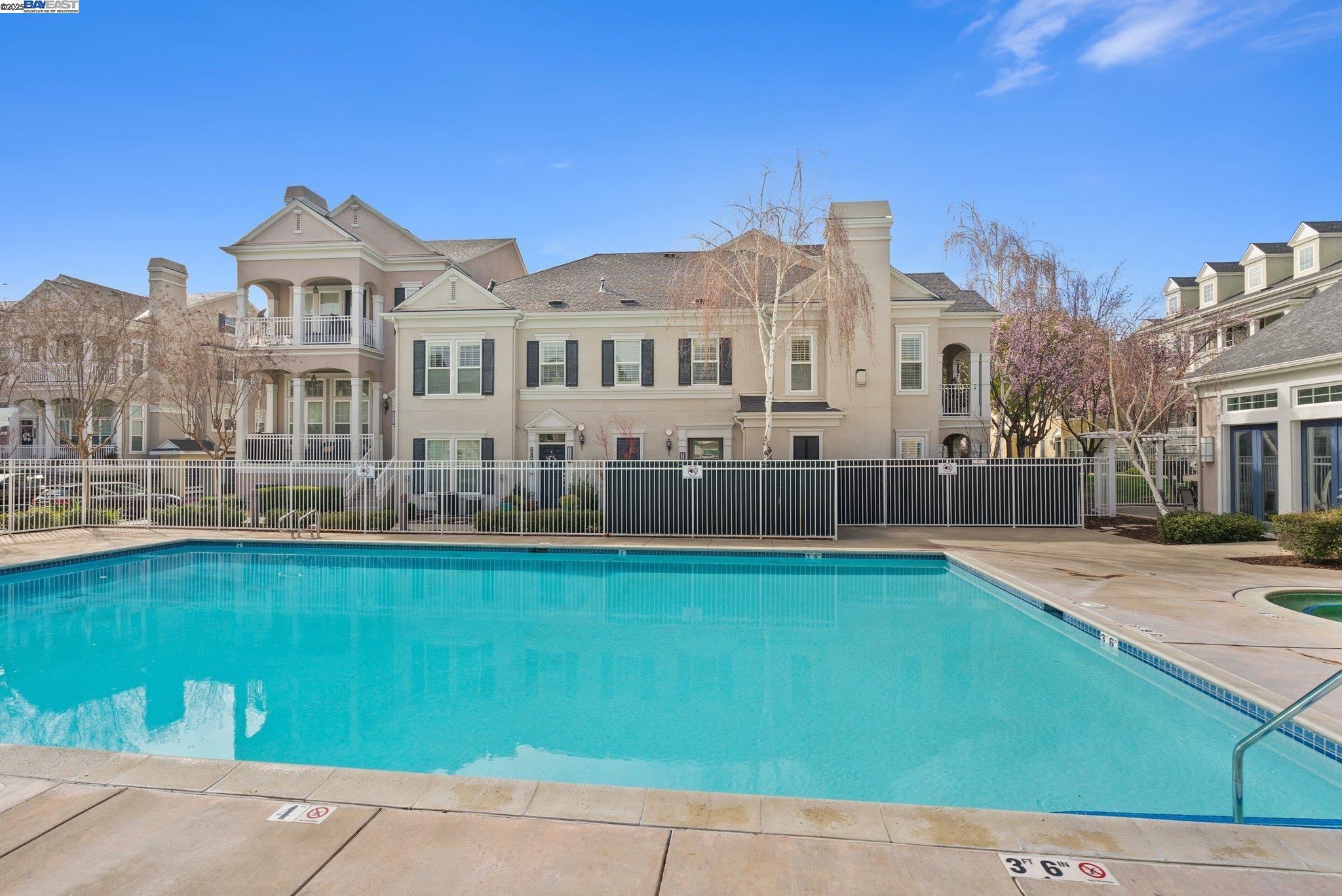 3658 Whitworth Drive Dublin, CA 94568 - Photo 36 of 36 a front view of a house with a garden and lake view