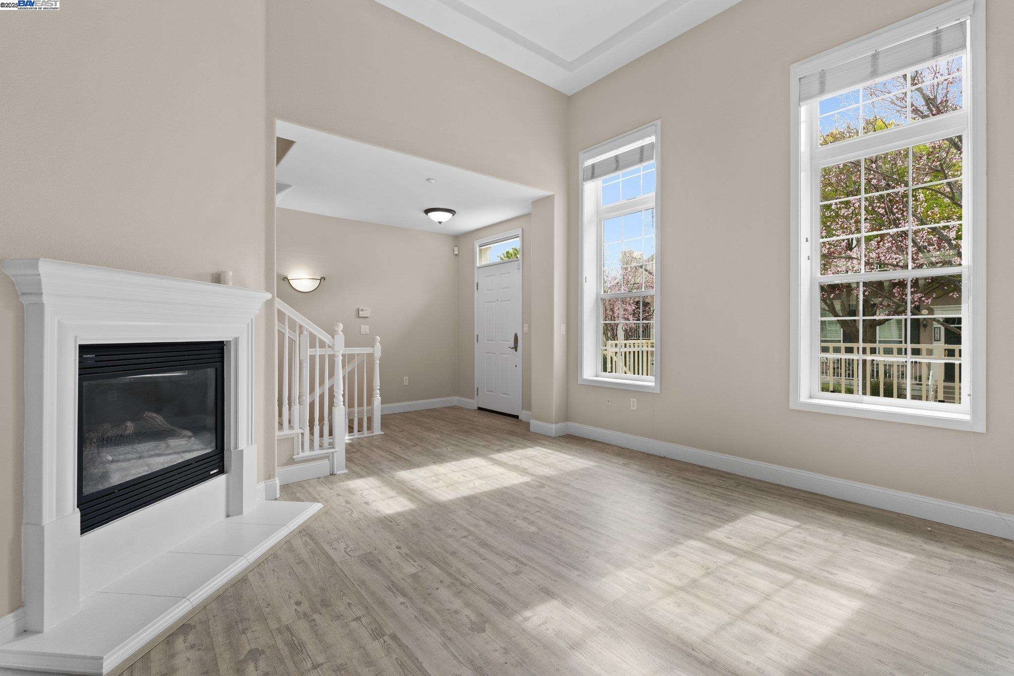 3658 Whitworth Drive Dublin, CA 94568 - Photo 6 of 36 a view of a big room with windows and fireplace