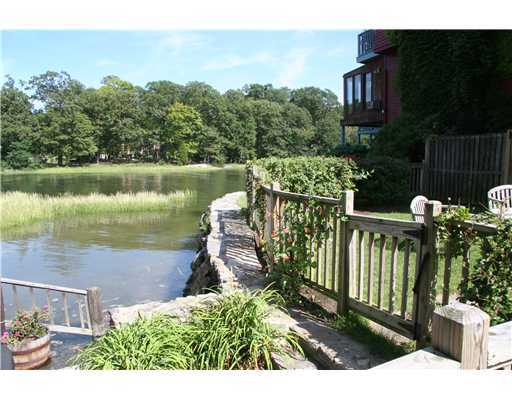 603 Steamboat Road, Unit 4 Greenwich, CT 06830 - Photo 1 of 14 a view of a garden with lake