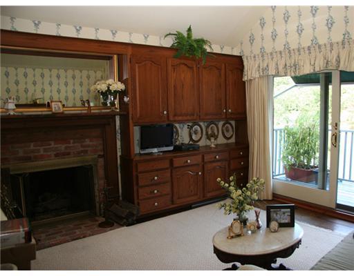 603 Steamboat Road, Unit 4 Greenwich, CT 06830 - Photo 11 of 14 a room with furniture and a fireplace