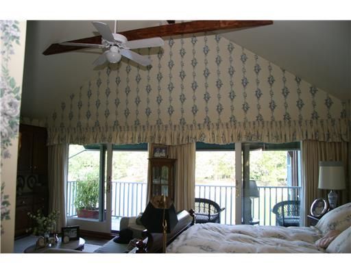 603 Steamboat Road, Unit 4 Greenwich, CT 06830 - Photo 12 of 14 a view of a porch with furniture and floor to ceiling window