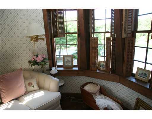 603 Steamboat Road, Unit 4 Greenwich, CT 06830 - Photo 13 of 14 a living room with furniture and a window