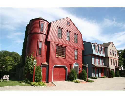 603 Steamboat Road, Unit 4 Greenwich, CT 06830 - Photo 2 of 14 a front view of residential houses with street
