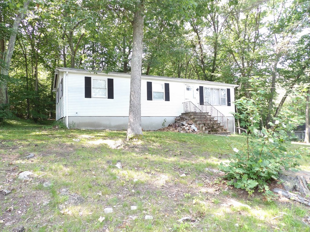 19 Kimball Road Amesbury, MA 01913 - Photo 1 of 26 a house view with a garden space