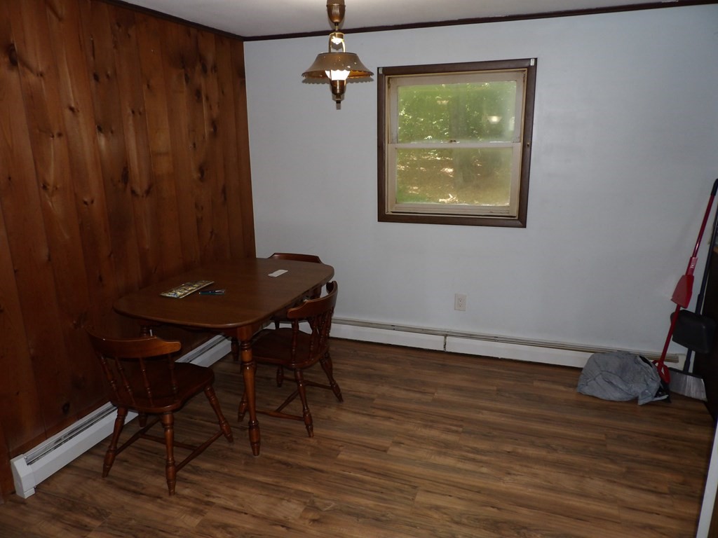 19 Kimball Road Amesbury, MA 01913 - Photo 14 of 26 a view of a workspace with furniture and wooden floor