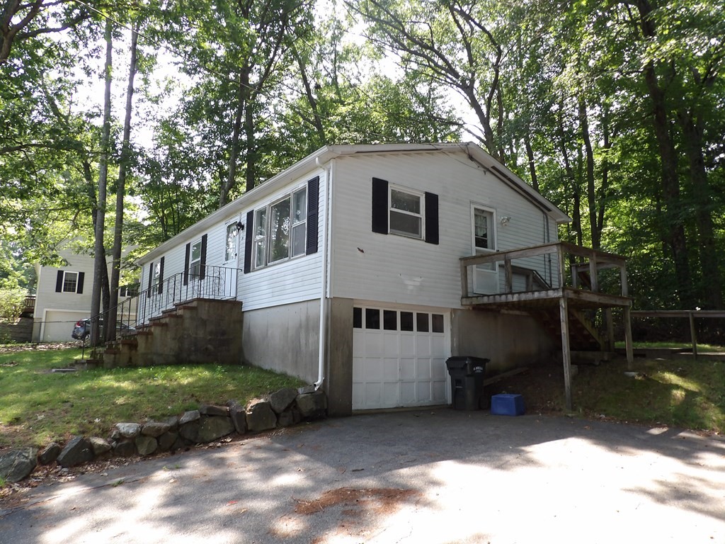 19 Kimball Road Amesbury, MA 01913 - Photo 2 of 26 a white house that has tree in front of it