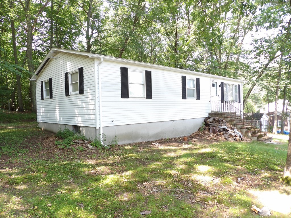 19 Kimball Road Amesbury, MA 01913 - Photo 3 of 26 a view of a house with a yard