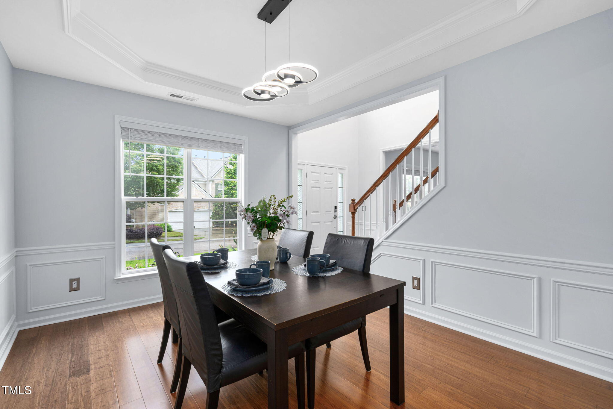 7612 Vista Del Rey Lane Raleigh, NC 27613 - Photo 17 of 73 Formal Dining Room With Wainscoting & Chair Rail