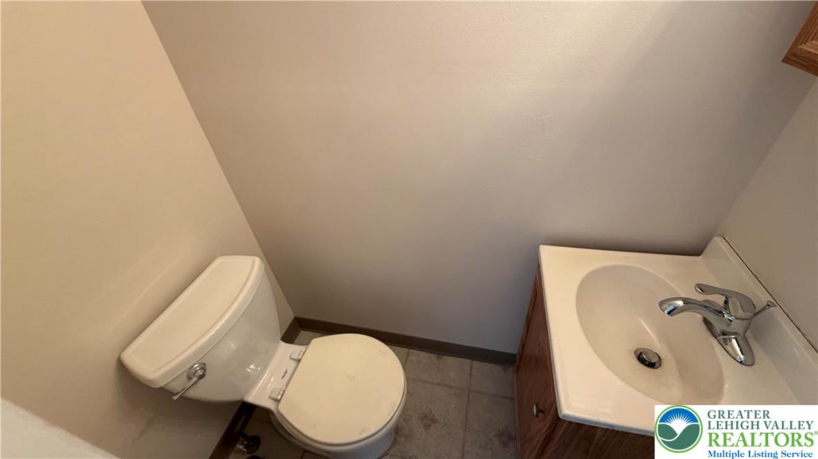 797 Main Street Tatamy, PA 18085 - Photo 12 of 41 a bathroom with a toilet and a sink